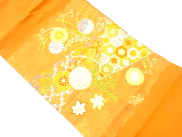 草花に亀甲・花菱模様織出し名古屋帯